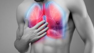 Почему болит за ребрами в спине