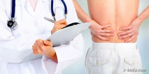 Почему при приседании болит спина